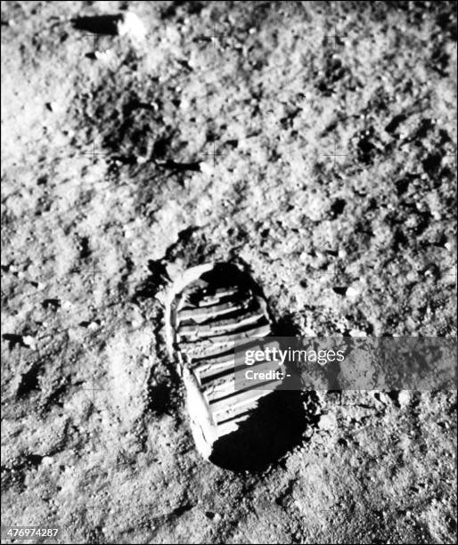 View of an astronaut's footprint on the moon. Apollo XI astronauts Neil Armstrong, Michael Collins and Edwin Aldrin were launched 16 July 1969 from...