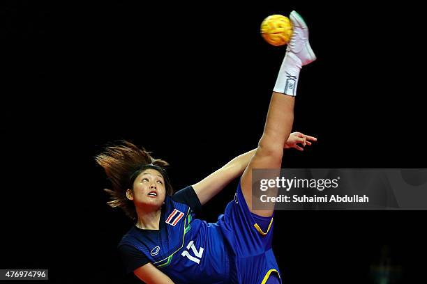 Wiphada Chitphuan of Thailand serves during the sepaktakraw women's regu semifinals match between Thailand and Vietnam at the Expo Hall 1 during the...