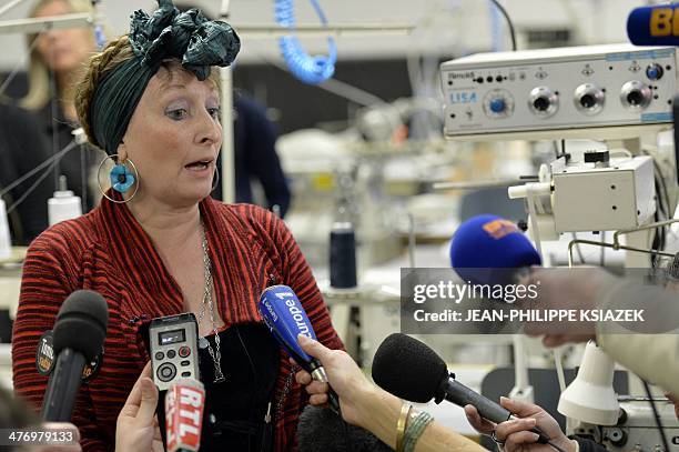 Founder and CEO of "Les Atelieres", Muriel Pernin gives a press conference on March 6, 2014 at "les Atelieres" lingerie plant in Villeurbanne, center...