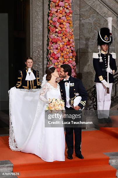 Prince Carl Philip of Sweden and his wife Princess Sofia of Sweden kiss after their royal wedding at The Royal Palace on June 13, 2015 in Stockholm,...