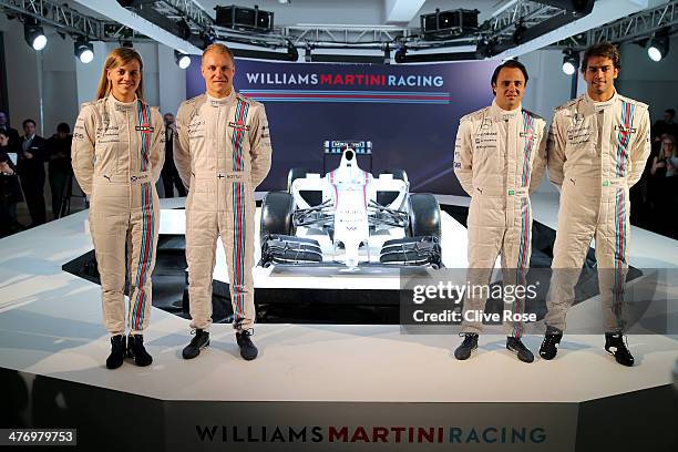 Susie Wolff, Valtteri Bottas, Felipe Massa and Felipe Nasr pose with the Williams Martini Racing formula one car on March 6, 2014 in London, England.