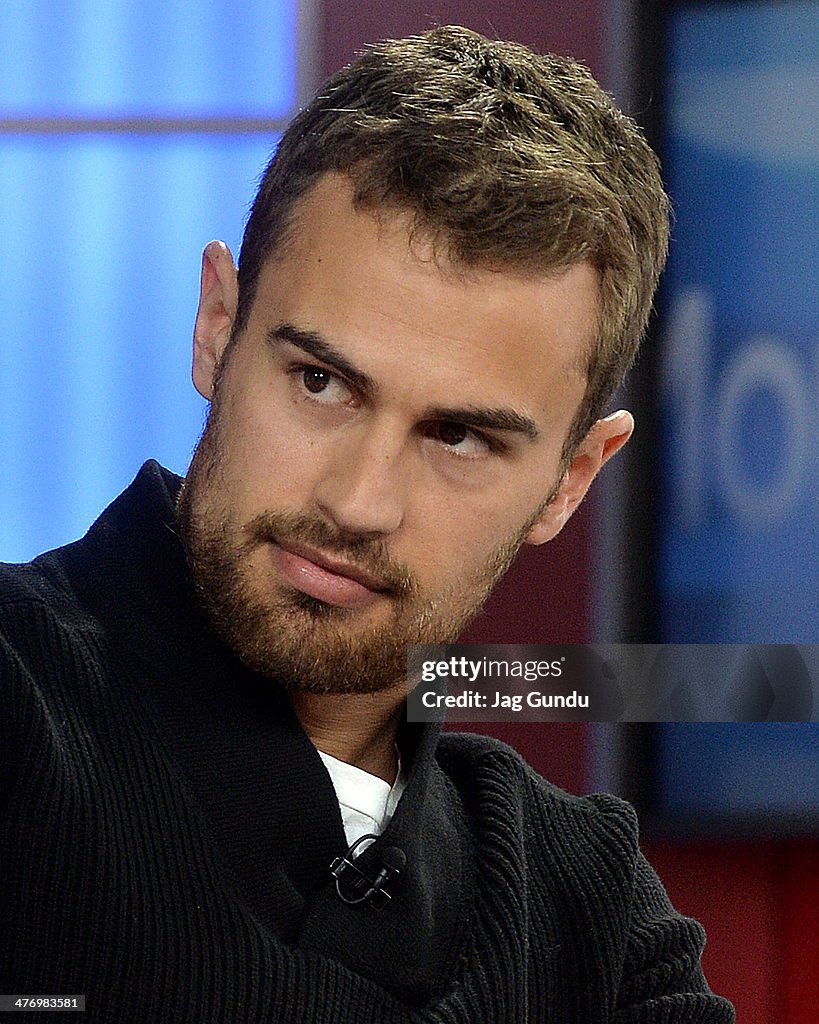 Theo James talks about his role as Four in the sci-fi movie Divergent... News Photo - Getty Images Theo James talks about his role as Four in the sci-fi movie Divergent... News Photo - Getty Images