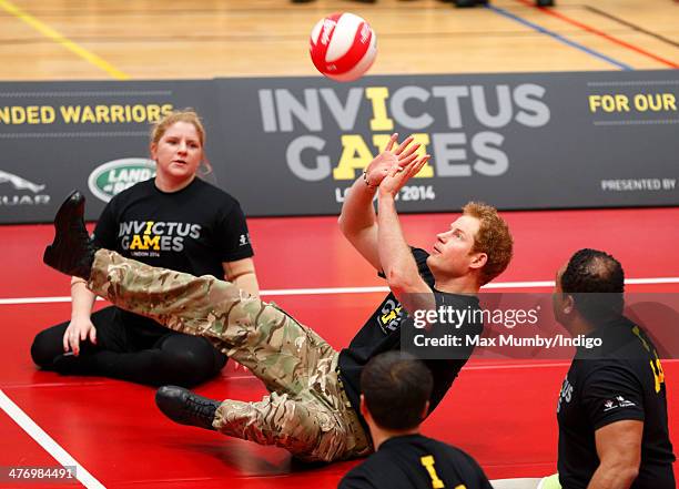 Prince Harry plays sitting Volleyball during the launch of the Invictus Games at the Copper Box Arena in the Queen Elizabeth Olympic Park on March 6,...