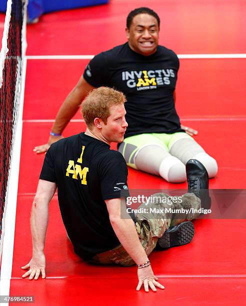 Prince Harry plays sitting Volleyball during the launch of the Invictus Games at the Copper Box Arena in the Queen Elizabeth Olympic Park on March 6,...