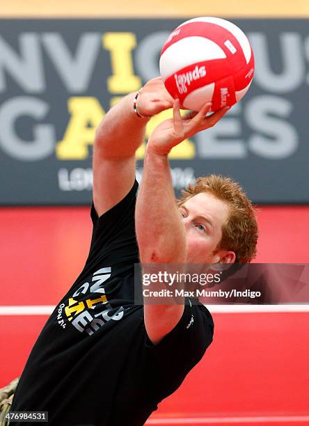 Prince Harry plays sitting Volleyball during the launch of the Invictus Games at the Copper Box Arena in the Queen Elizabeth Olympic Park on March 6,...