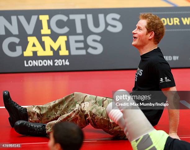 Prince Harry plays sitting Volleyball during the launch of the Invictus Games at the Copper Box Arena in the Queen Elizabeth Olympic Park on March 6,...