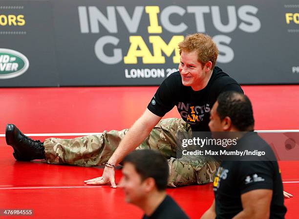 Prince Harry plays sitting Volleyball during the launch of the Invictus Games at the Copper Box Arena in the Queen Elizabeth Olympic Park on March 6,...