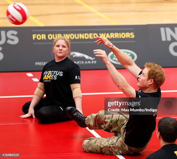 Prince Harry plays sitting Volleyball during the launch of the Invictus Games at the Copper Box Arena in the Queen Elizabeth Olympic Park on March 6,...