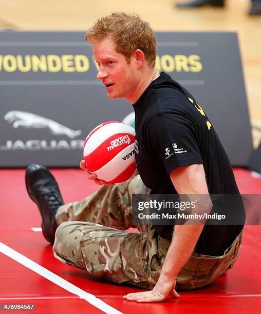 Prince Harry plays sitting Volleyball during the launch of the Invictus Games at the Copper Box Arena in the Queen Elizabeth Olympic Park on March 6,...