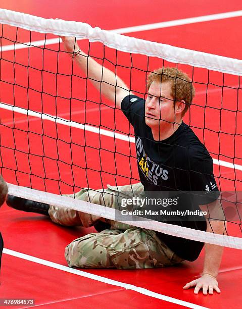 Prince Harry plays sitting Volleyball during the launch of the Invictus Games at the Copper Box Arena in the Queen Elizabeth Olympic Park on March 6,...