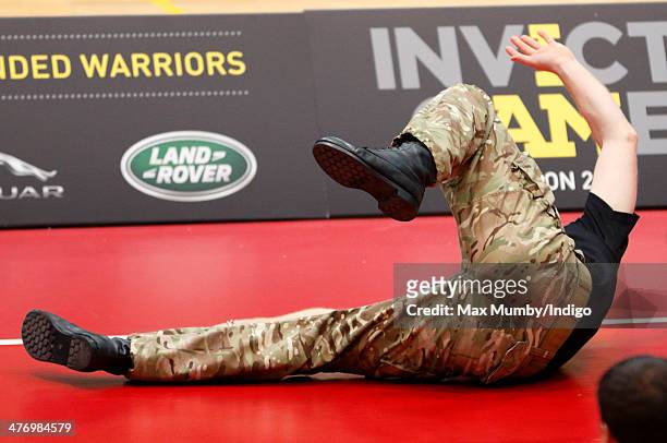 Prince Harry plays sitting Volleyball during the launch of the Invictus Games at the Copper Box Arena in the Queen Elizabeth Olympic Park on March 6,...