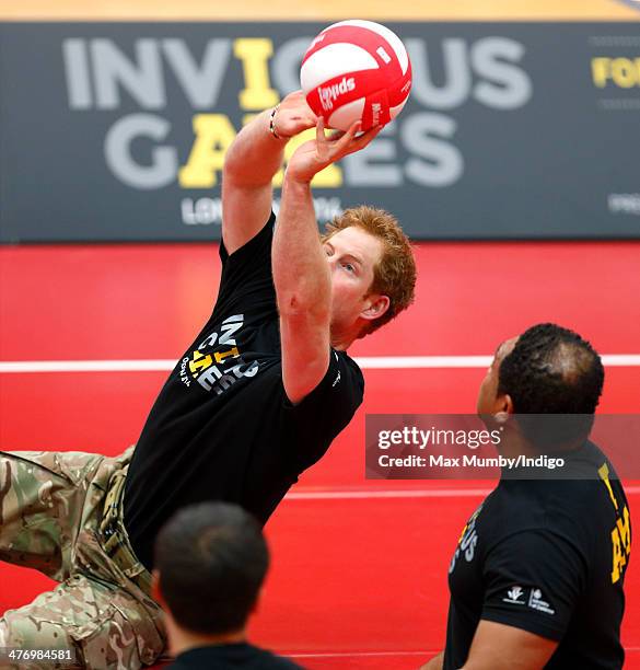 Prince Harry plays sitting Volleyball during the launch of the Invictus Games at the Copper Box Arena in the Queen Elizabeth Olympic Park on March 6,...