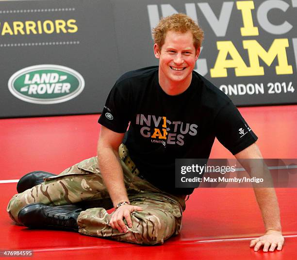 Prince Harry plays sitting Volleyball during the launch of the Invictus Games at the Copper Box Arena in the Queen Elizabeth Olympic Park on March 6,...