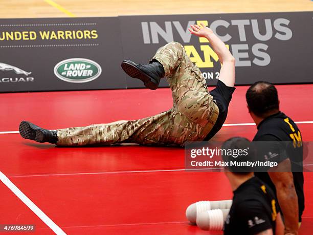 Prince Harry plays sitting Volleyball during the launch of the Invictus Games at the Copper Box Arena in the Queen Elizabeth Olympic Park on March 6,...