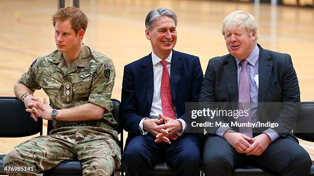 Prince Harry, Philip Hammond and Boris Johnson attend the launch of the Invictus Games at the Copper Box Arena in the Queen Elizabeth Olympic Park on...