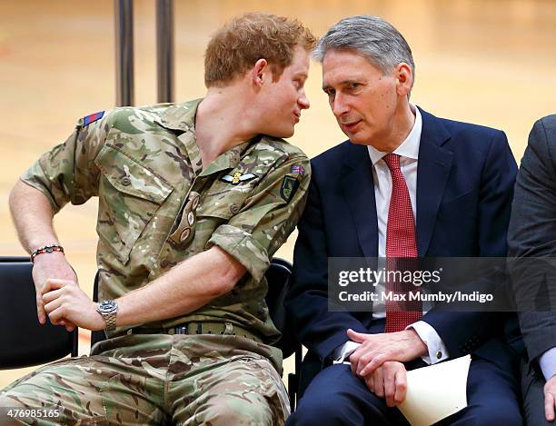 Prince Harry and Philip Hammond attend the launch of the Invictus Games at the Copper Box Arena in the Queen Elizabeth Olympic Park on March 6, 2014...