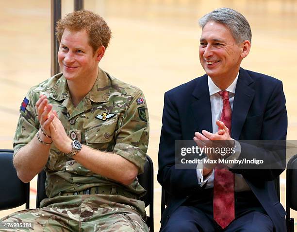 Prince Harry and Philip Hammond attend the launch of the Invictus Games at the Copper Box Arena in the Queen Elizabeth Olympic Park on March 6, 2014...