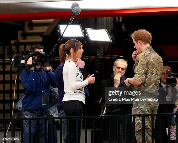 Alex Jones, presenter of The One Show, interviews Prince Harry during the launch of the Invictus Games at the Copper Box Arena in the Queen Elizabeth...