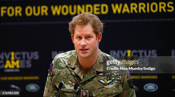 Prince Harry makes a speech as he attends the launch of the Invictus Games at the Copper Box Arena in the Queen Elizabeth Olympic Park on March 6,...