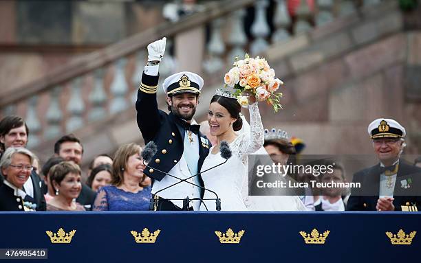 Prince Carl Philip of Sweden and his wife Princess Sofia of Sweden on the balcony after their royal wedding at The Royal Palace on June 13, 2015 in...