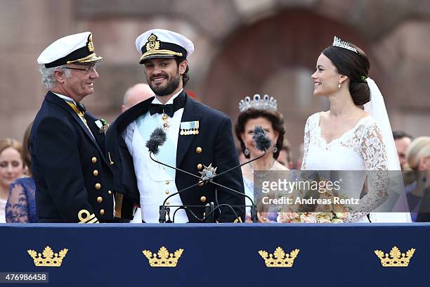 Prince Carl Philip of Sweden and his wife Princess Sofia of Sweden are being congratulated by King Carl XVI Gustaf of Sweden after their marriage...