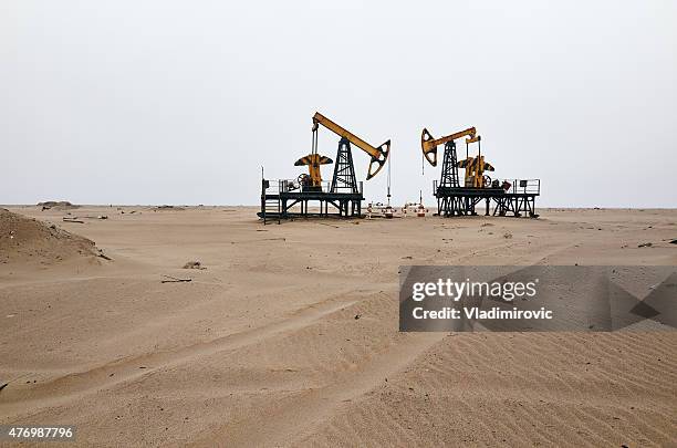 oil rig sand - russian far east stock pictures, royalty-free photos & images