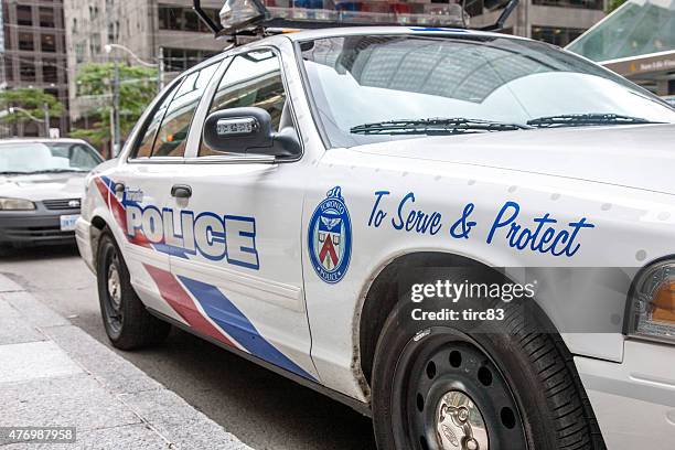 toronto police car parked in downtown  toronto - toronto police stock pictures, royalty-free photos & images