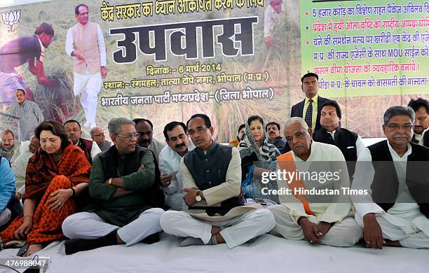 Madhya Pradesh Chief Minister Shivraj Singh Chouhan, along with his Cabinet colleagues sitting on fast against the Central governments apathy towards...