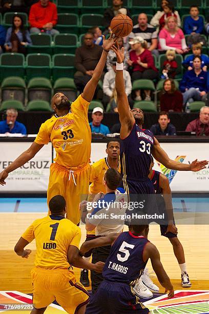 Melvin Ely of the Texas Legends and Ike Diogu of the Bakersfield Jam go up for the jumpball on March 5, 2014 at Dr. Pepper Arena in Frisco, Texas....