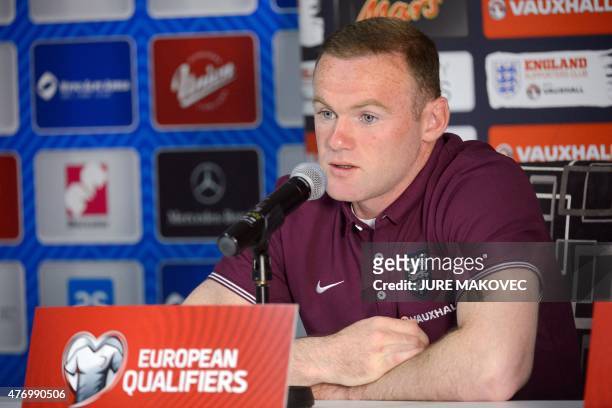 England's forward Wayne Rooney gives a press conference on June 13, 2015 prior to the Euro 2016 qualifying football match between Slovenia and...