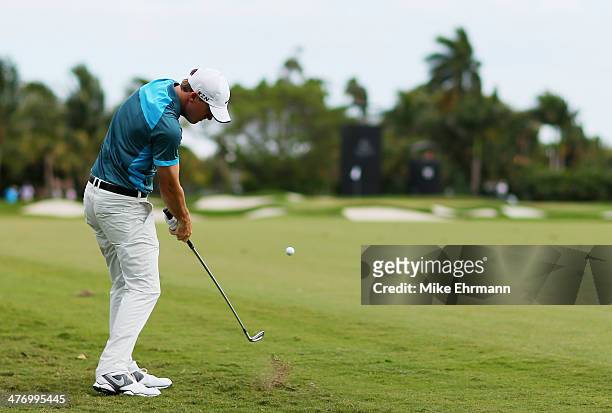 Russell Henley plays a shot on the 11th hole during the first round of the World Golf Championships-Cadillac Championship at Trump National Doral on...