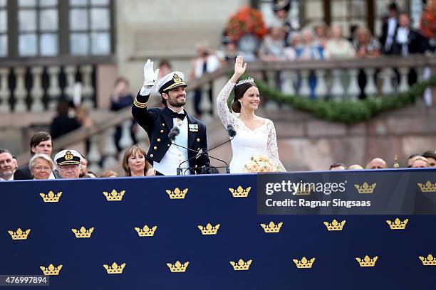 Prince Carl Philip of Sweden and HRH Princess Sofia, Duchess of Varmland ride in the wedding cortege after their marriage ceremony on June 13, 2015...