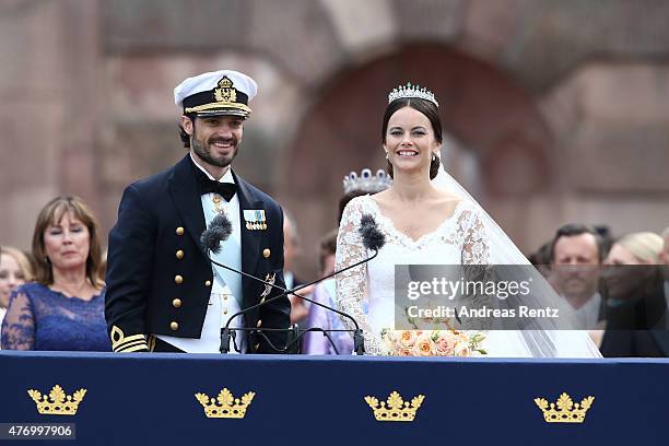 Prince Carl Philip of Sweden and HRH Princess Sofia, Duchess of Varmland ride in the wedding cortege after their marriage ceremony on June 13, 2015...