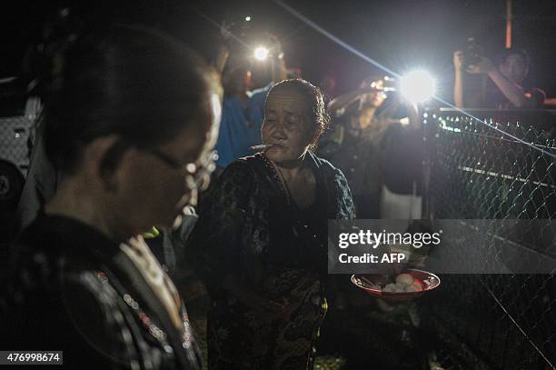 Jupirin Gombur a shaman from the Kadazan-Dusun tribe offers prayers during the Monolibabow rituals in Damat, in the district of Tamparuli, in...
