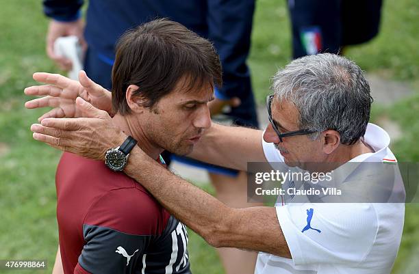 Head coach Antonio Conte and Doctor Enrico Castellacci before an Italy training session at Coverciano on June 13, 2015 in Florence, Italy.