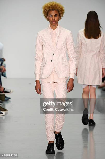 Model walks the runway at the Matthew Miller Spring Summer 2016 fashion show during London Menswear Fashion Week on June 13, 2015 in London, United...