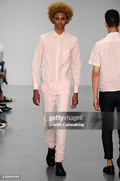 Model walks the runway at the Matthew Miller Spring Summer 2016 fashion show during London Menswear Fashion Week on June 13, 2015 in London, United...