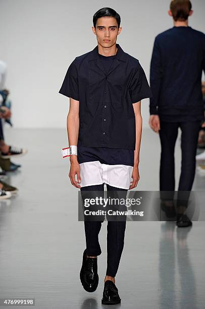 Model walks the runway at the Matthew Miller Spring Summer 2016 fashion show during London Menswear Fashion Week on June 13, 2015 in London, United...