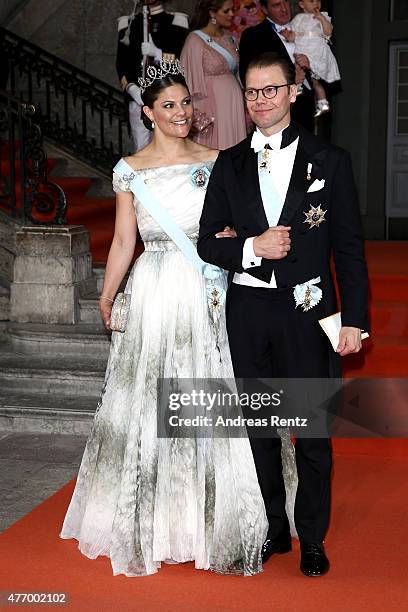 Crown Princess Victoria of Sweden and her husband Prince Daniel of Sweden depart after the royal wedding of Prince Carl Philip of Sweden and Sofia...