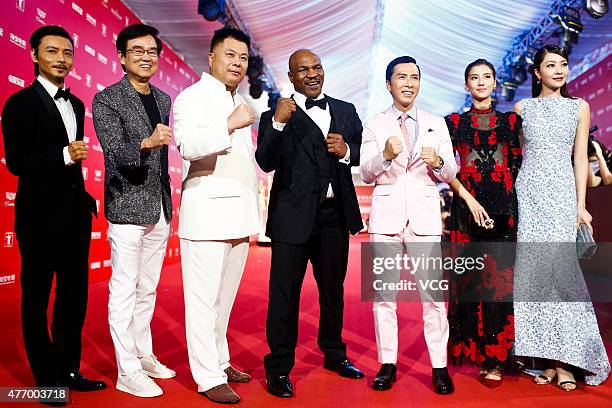 Actor Max Zhang, producer Bak-Ming Wong, producer Shi Jianxiang, Mike Tyson, actor Donnie Yen, actress Karena Ng and actress Lynn Xiong arrive at the...