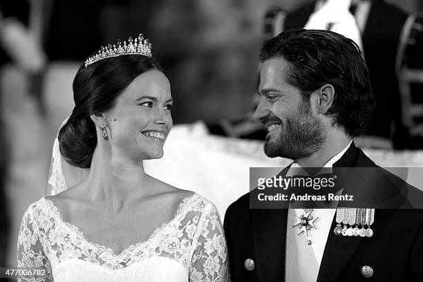 Prince Carl Philip of Sweden and his wife Princess Sofia of Sweden look at one another and smile after their marriage ceremony on June 13, 2015 in...