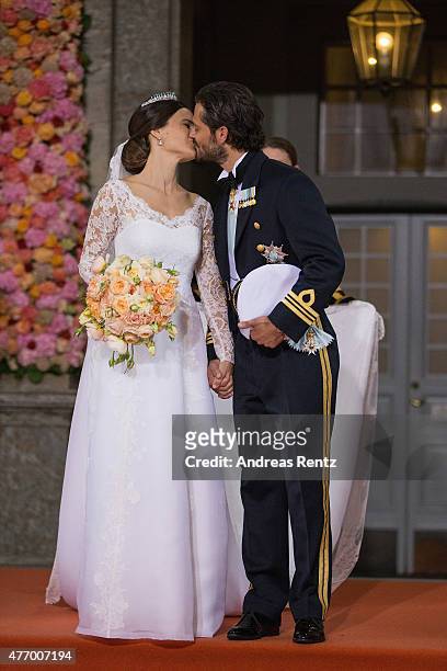 Prince Carl Philip of Sweden kisses his new wife Princess Sofia of Sweden after their marriage ceremony at The Royal Palace on June 13, 2015 in...