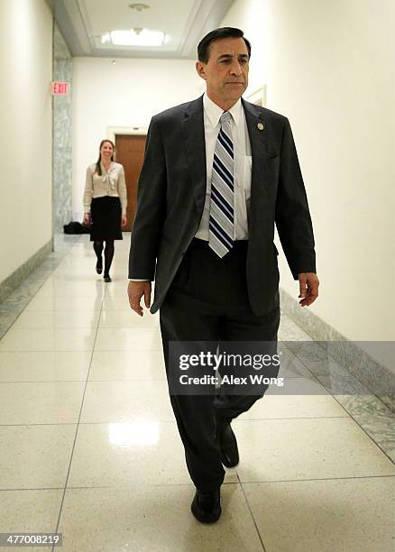 House Oversight & Government Reform Committee Chairman Rep. Darrel Issa returns to his office after votes on the House floor March 6, 2014 on Capitol...