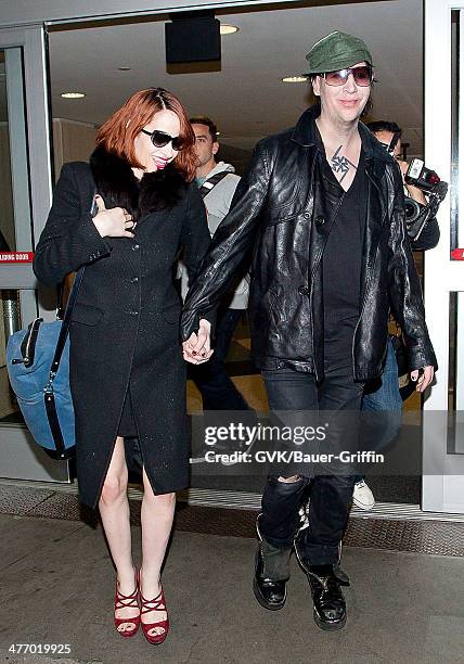 Marilyn Manson and Lindsay Usich are seen at LAX on November 14, 2012 in Los Angeles, California.