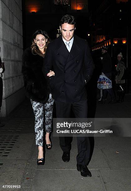 Kelly Brook is seen with her boyfriend Thom Evans on November 23, 2012 in London, United Kingdom.