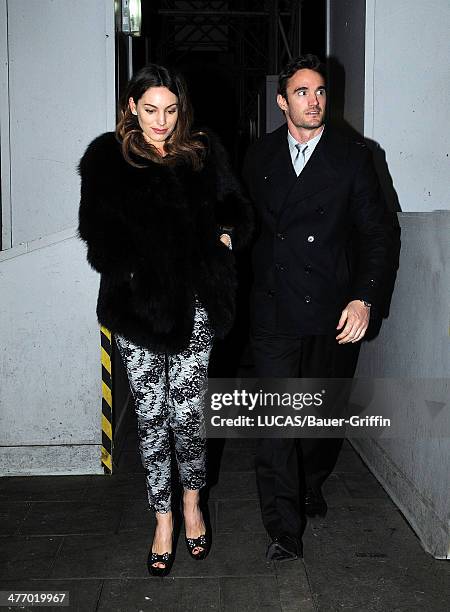 Kelly Brook is seen with her boyfriend Thom Evans on November 23, 2012 in London, United Kingdom.