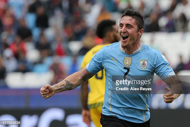 Cristian Rodriguez of Uruguay celebrates after scoring the opening goal during the 2015 Copa America Chile Group B match between Uruguay and Jamaica...
