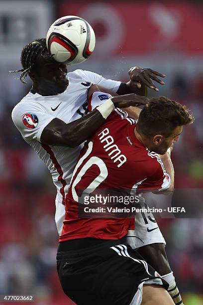 Steve Mandanda of France clashes with Valdeta Rama of Albania during the international friendly match between Albania and France at Elbasan Arena on...