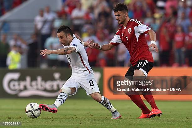 Armando Sadiku of France in action against Mathieu Valbuena of Albania during the international friendly match between Albania and France at Elbasan...