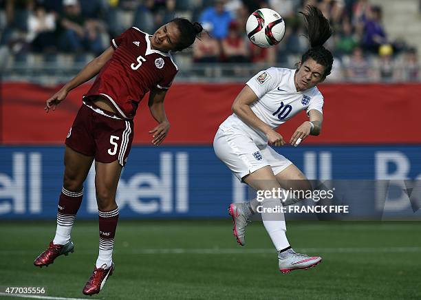 England's forward Karen Carney scores a goal next to Mexico's defender Valeria Miranda during their Group F match at the 2015 FIFA Women's World Cup...